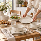 16-Piece Ivory Speckled Porcelain Dinnerware